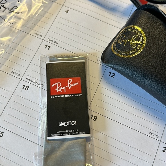 Ray Ban sunglasses. New Unisex comes with items shown